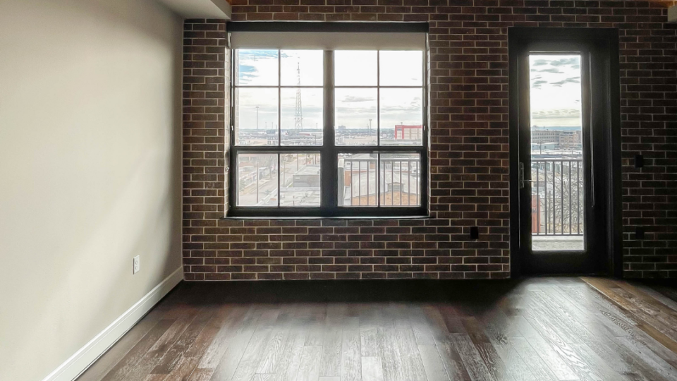 Studio with brick accent wall